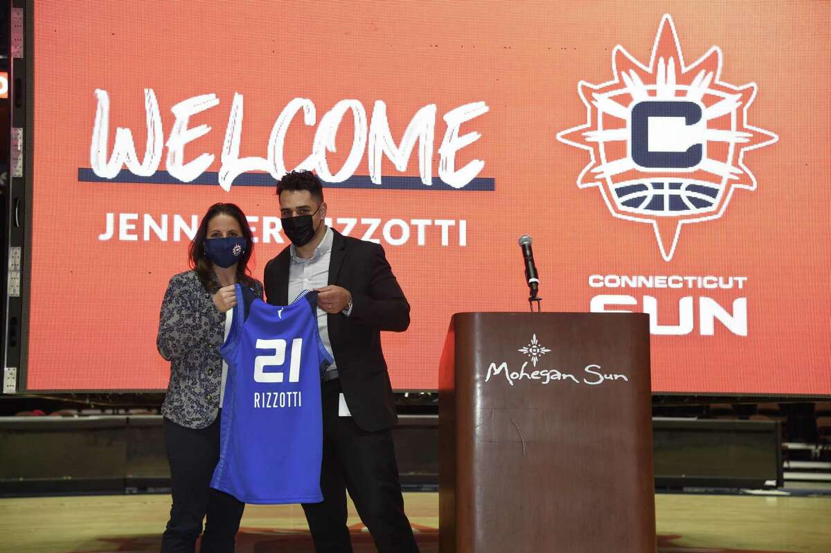 Jennifer Rizzotti was introduced as president of the WNBA’s Connecticut Sun on Tuesday, April 27, 2021 at Mohegan Sun Arena in Uncasville, Conn. Posing with Rizzotti is Jeff Hamilton Mohegan Sun President and General Manager.