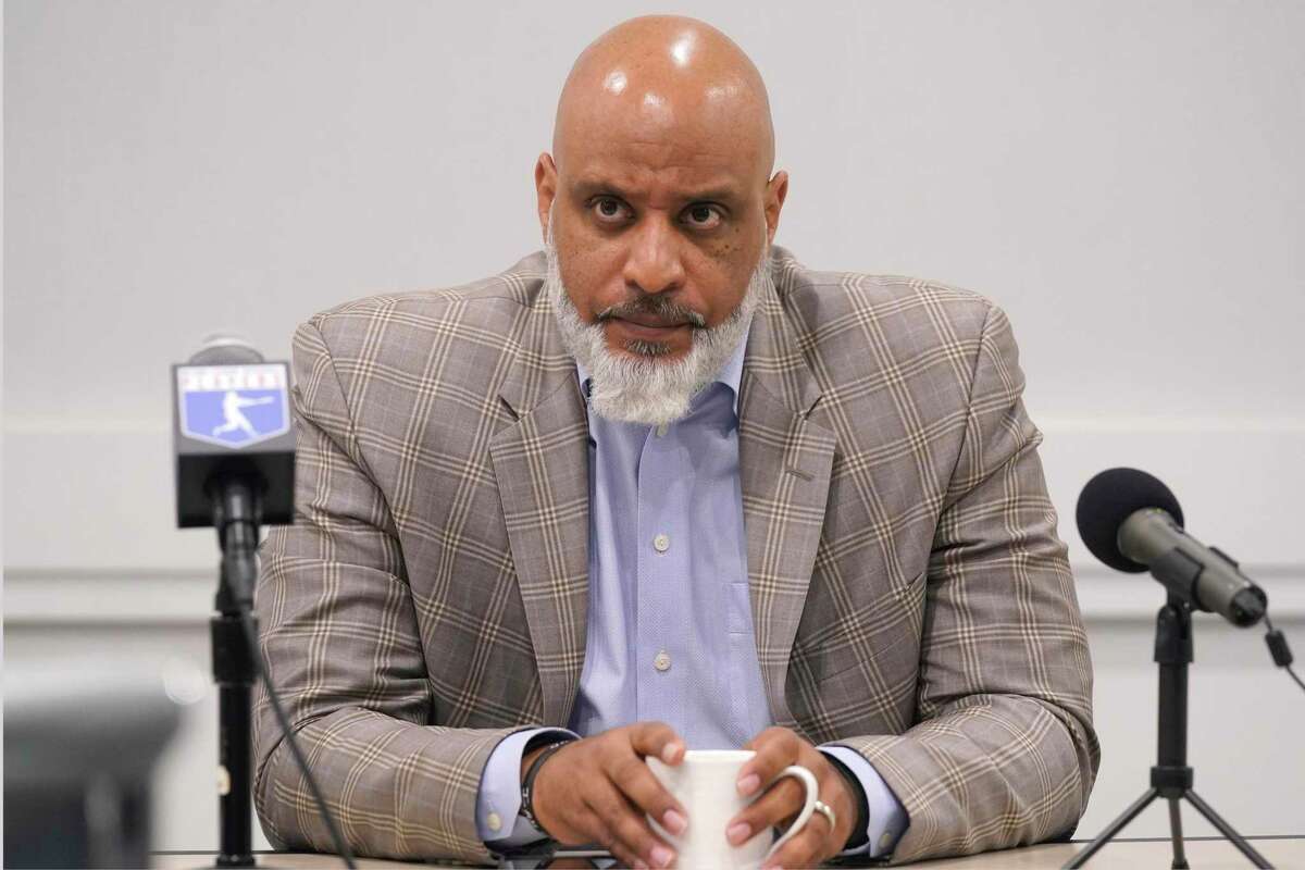 FILE - Major League Baseball union head Tony Clark listens to a question during a media availability in Irving, Texas, Thursday, Dec. 2, 2021. Major League Baseball and the players’ association are scheduled to meet Thursday, Jan. 13, 2022, in the first negotiations between the parties since labor talks broke off Dec. 1. The planning of the meeting was disclosed to The Associated Press by a person familiar with the negotiations who spoke on condition of anonymity because no announcement was made. (AP Photo/LM Otero, File)