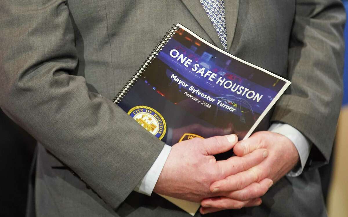 A copy of Houston Mayor Sylvester Turner’s “One Safe Houston” initiative program to help reduce violent crime on Wednesday, Feb. 2, 2022 in Houston.