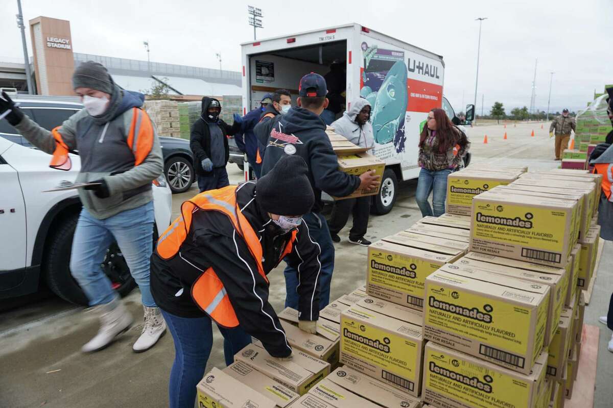 Girl Scout Cookies are loaded onto a truck on Thursday, Feb. 3, at Legacy Stadium in Katy ahead of cookie season, which begins in the Houston area on Saturday, Feb. 12.