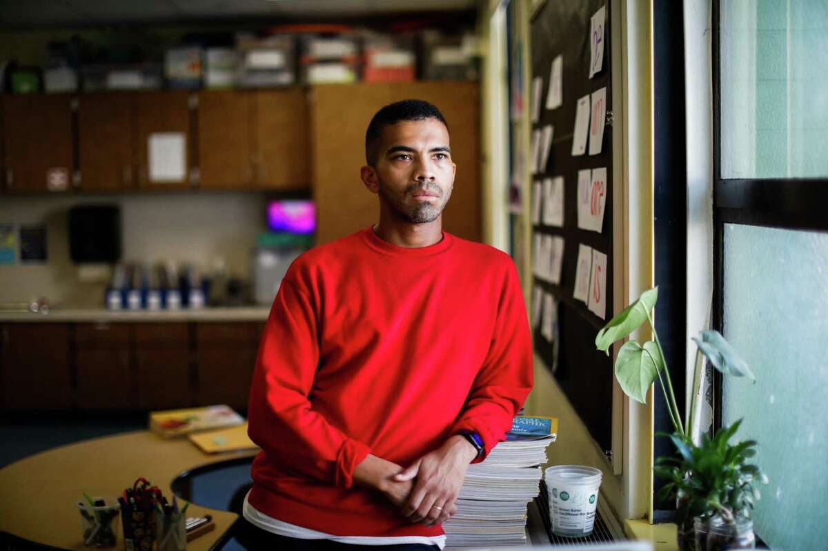 Christopher Johnson of Oakland, a teacher at Bryant Elementary School in San Francisco’s Mission District, is concerned he will get laid off because he lacks seniority.