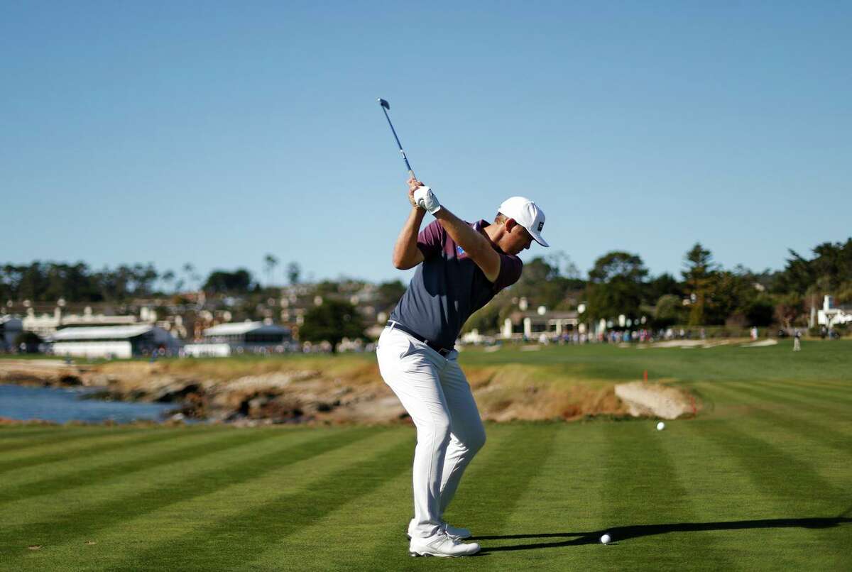 Seamus Power of Ireland plays his shot from the 18th tee during the second round of the AT&T Pebble Beach Pro-Am. He will begin Saturday at 16-under-par, with a five-shot advantage.