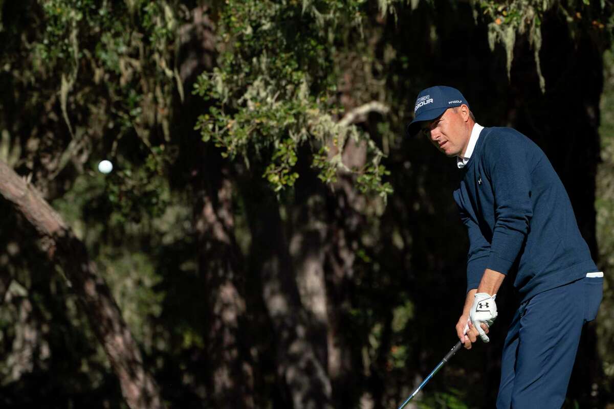 Jordan Spieth chips from the fringe on the 8th hole on the Spyglass Hill Golf Course at the AT&T Pebble Beach Pro-Am on Friday, Feb. 4, 2022 in Pebble Beach, Calif.