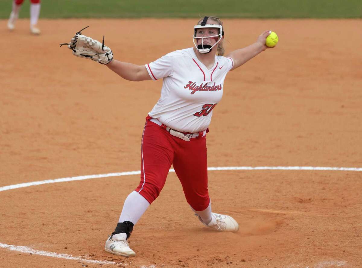 The Woodlands pitcher Saylor Davis (30) pitches the ball during the second inning of a Region II-6A bi-district playoff game at The Woodlands High School, Thursday, April 29, 2021, in The Woodlands.