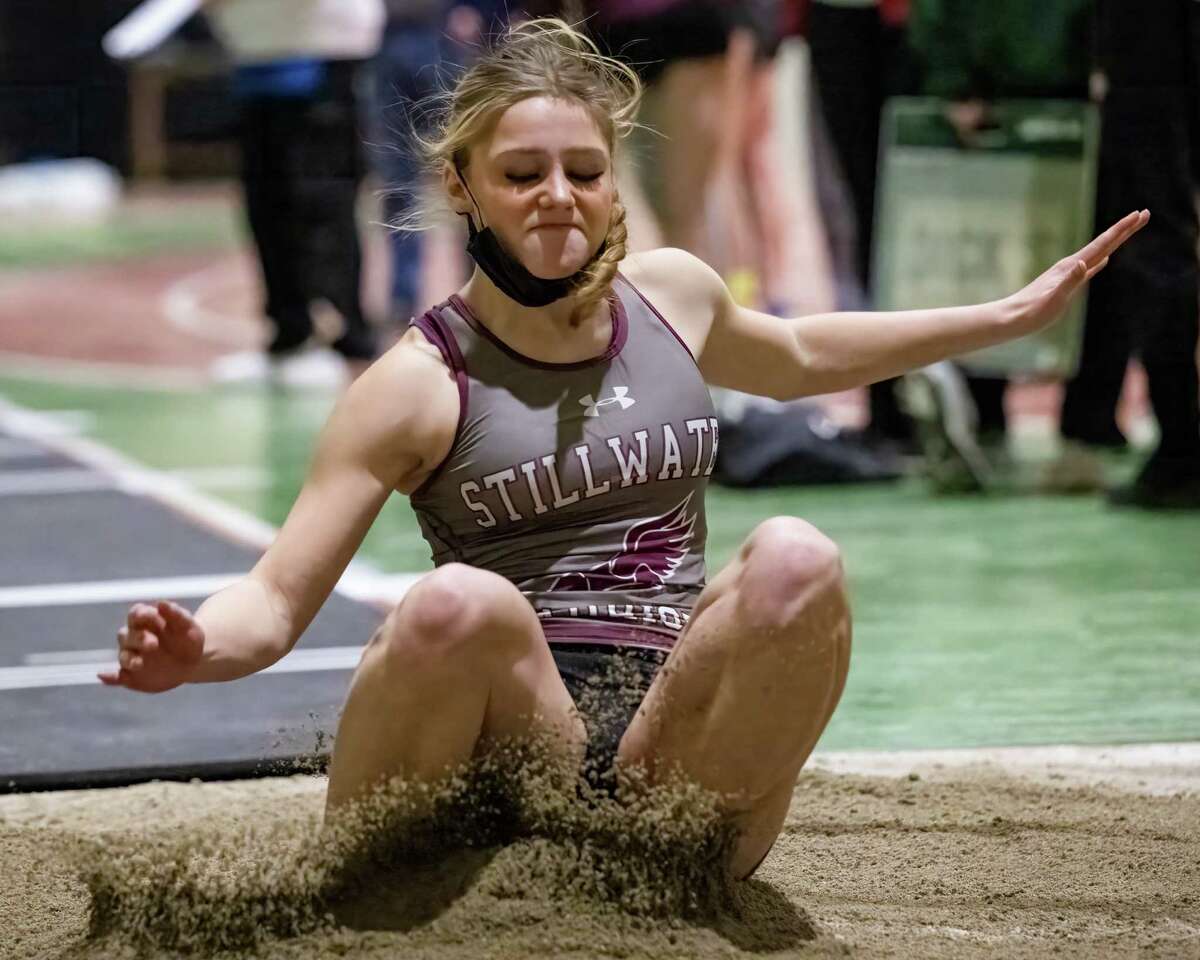 Stillwater senior Gianna Locci, shown competing in the triple jump at the indoor track state qualifier at Hudson Valley Community College, nearly couldn't jump at all for the spring before breaking out to win the state and Federation titles in long jump.