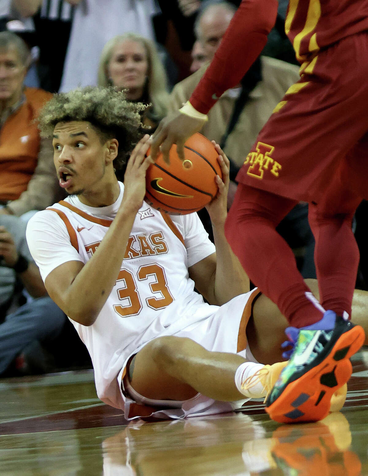 AUSTIN, TEXAS - FEBRUARY 05: Tre Mitchell #33 of the Texas Longhorns looks to pass the ball against the Iowa State Cyclones at the Frank Erwin Center on February 05, 2022 in Austin, Texas. (Photo by Chris Covatta/Getty Images)