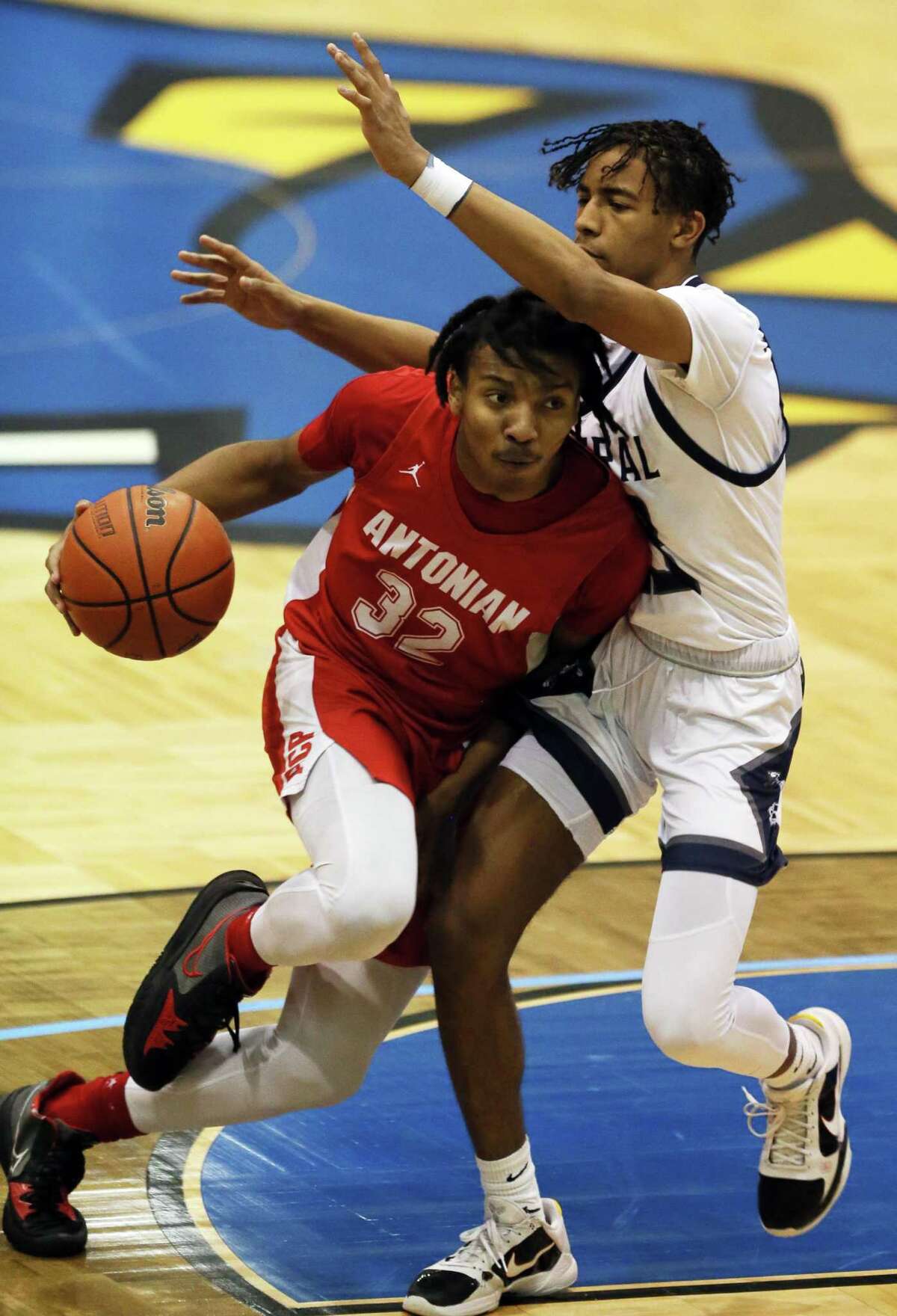 Antonian freshman Isaiah Fox (32) drives to the basket during the TAPPS 3-6A basketball game against Central Catholic Saturday, Feb. 5, 2022, at Bill Greehey Arena in San Antonio, Texas. [Sam Grenadier/San Antonio Express-News]
