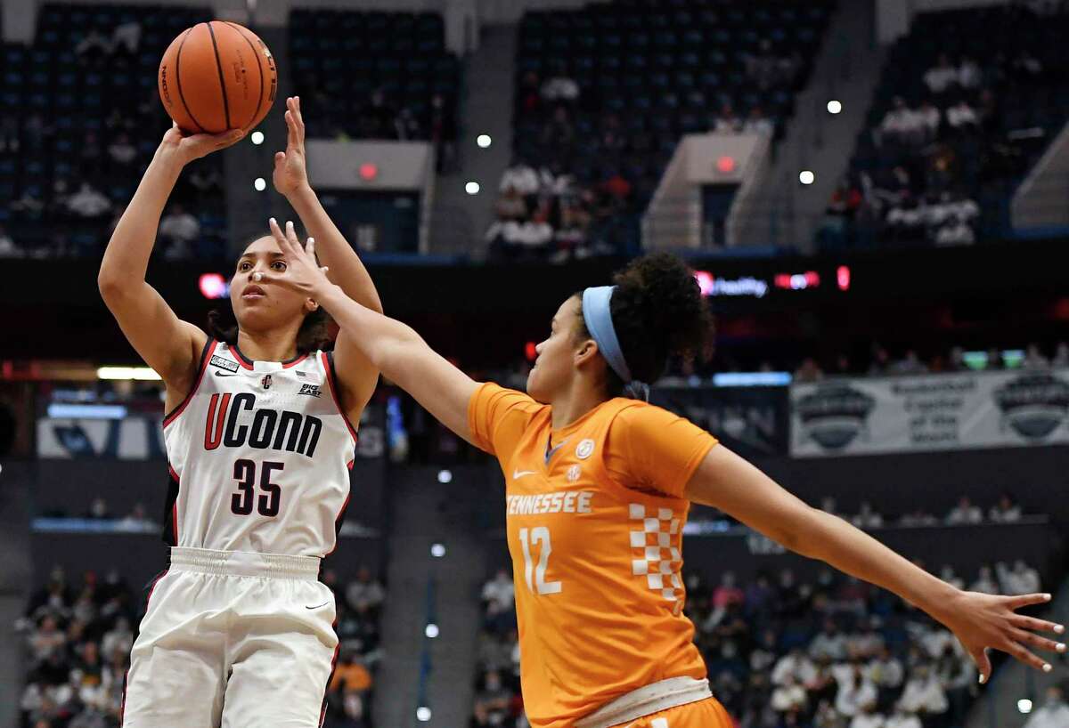 UConn’s Azzi Fudd shoots as Tennessee’s Rae Burrell defends in the second half Sunday in Hartford.