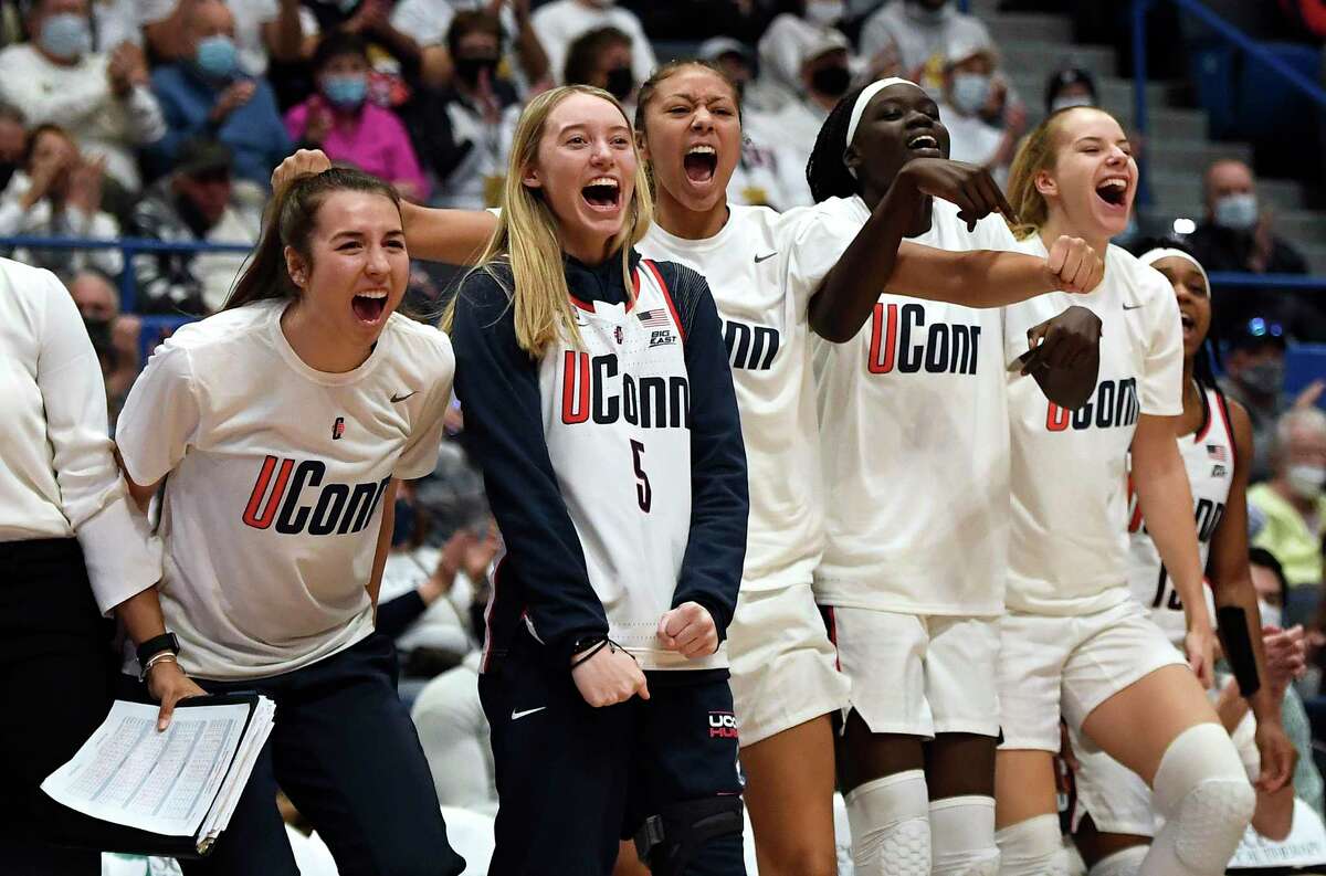 From left, UConn’sCaroline Ducharme, Paige Bueckers, Amari DeBerry, Piath Gabriel and Dorka Juhász react on the bench in the second half of Sunday’s game against Tennessee.