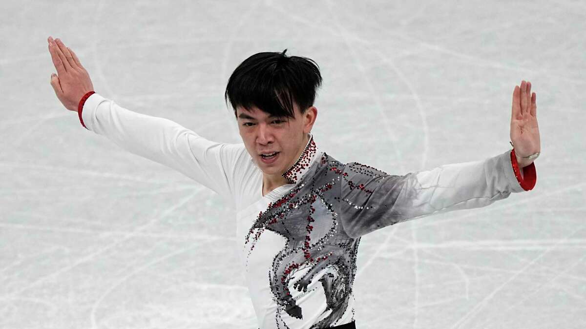 Vincent Zhou, of the United States, competes in the men's team free skate program during the figure skating competition at the 2022 Winter Olympics, Sunday, Feb. 6, 2022, in Beijing. (AP Photo/David J. Phillip)