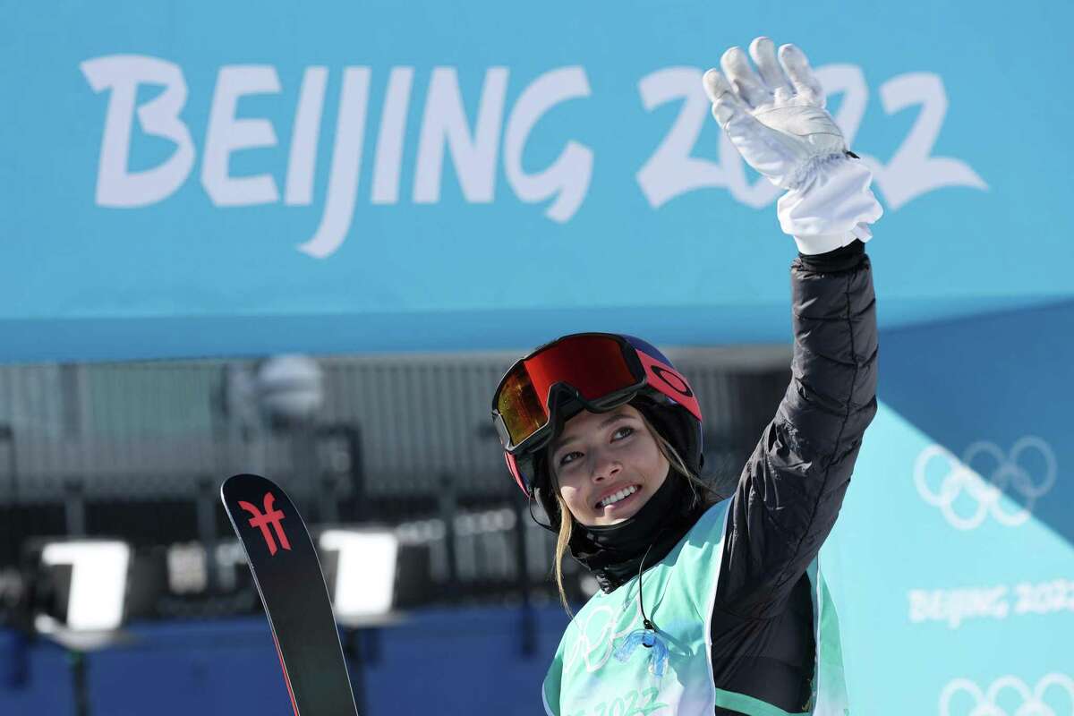 BEIJING, CHINA - FEBRUARY 07: Ailing Eileen Gu of Team China waves after their run during the Women's Freestyle Skiing Freeski Big Air Qualification on Day 3 of the Beijing 2022 Winter Olympic Games at Big Air Shougang on February 07, 2022 in Beijing, China. (Photo by Harry How/Getty Images)