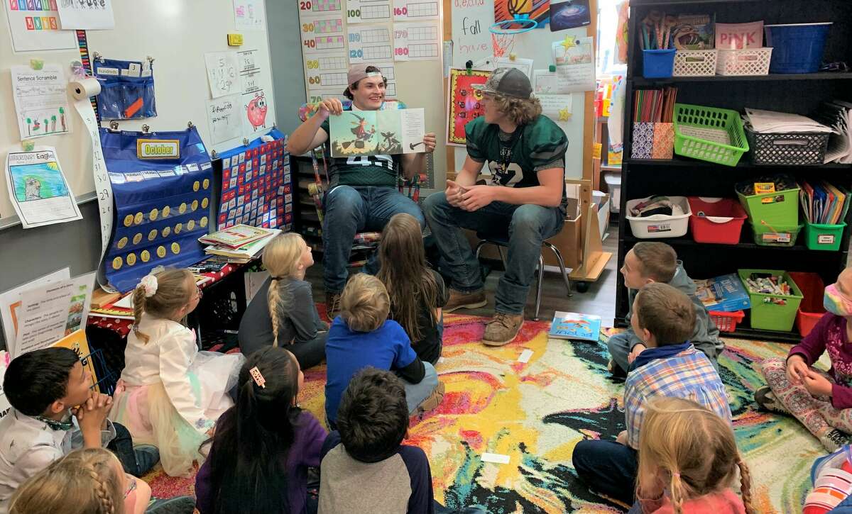 Laker football program adopts reading program for elementary students