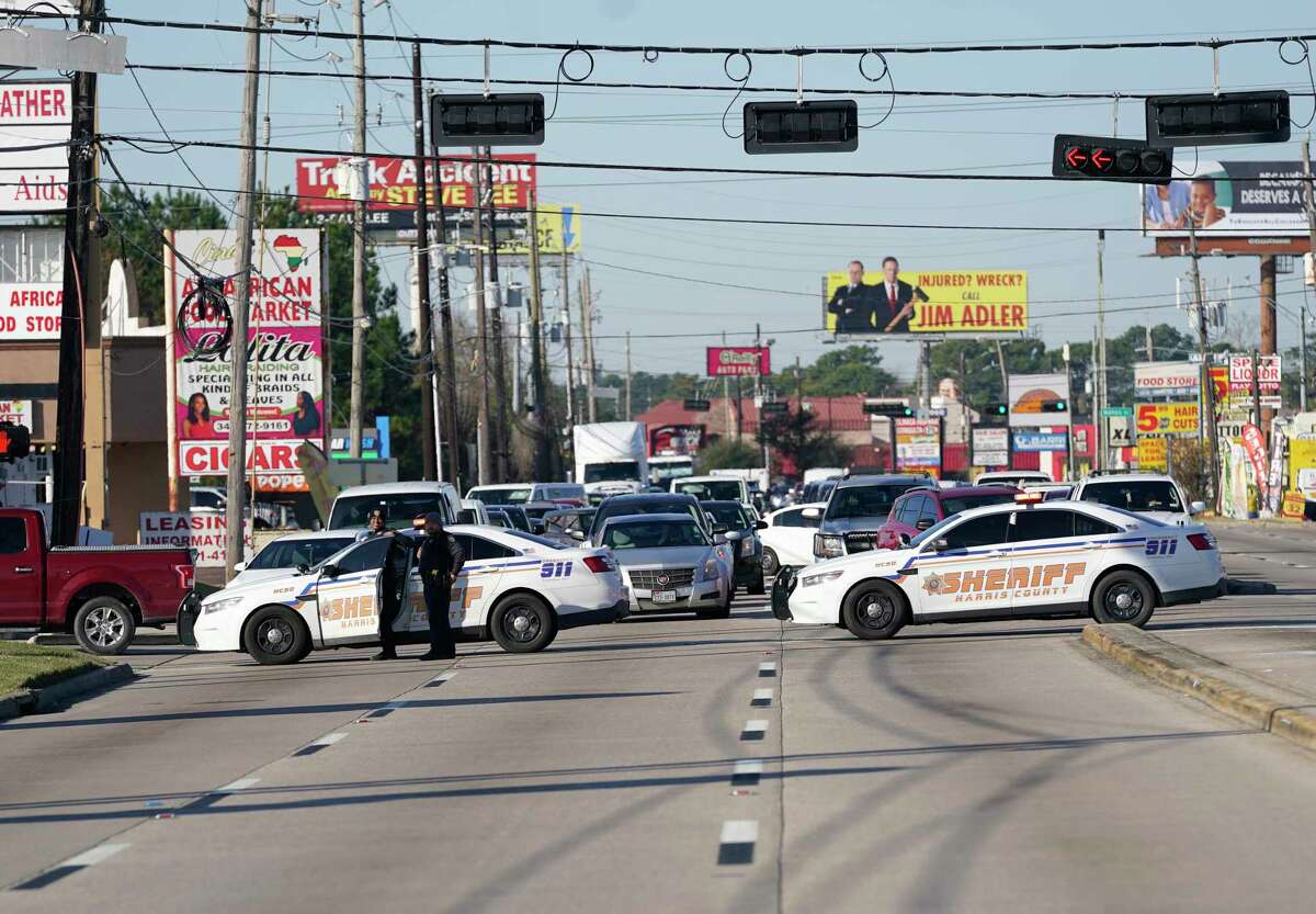 Harris County Sheriff’s Deputies block traffic along FM 1960 during an investigation of a fatal hit-and-run that left a pedestrian dead in the 800 block of FM 1960 Monday, Feb. 7, 2022 in Houston.
