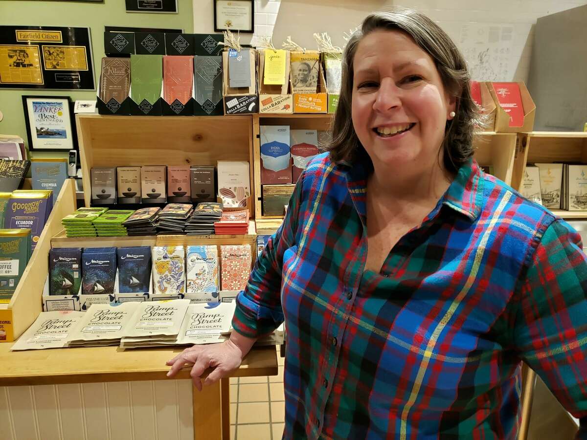 Laura Downey, owner of The Fairfield Cheese Company with her bean-to-bar chocolate display. 