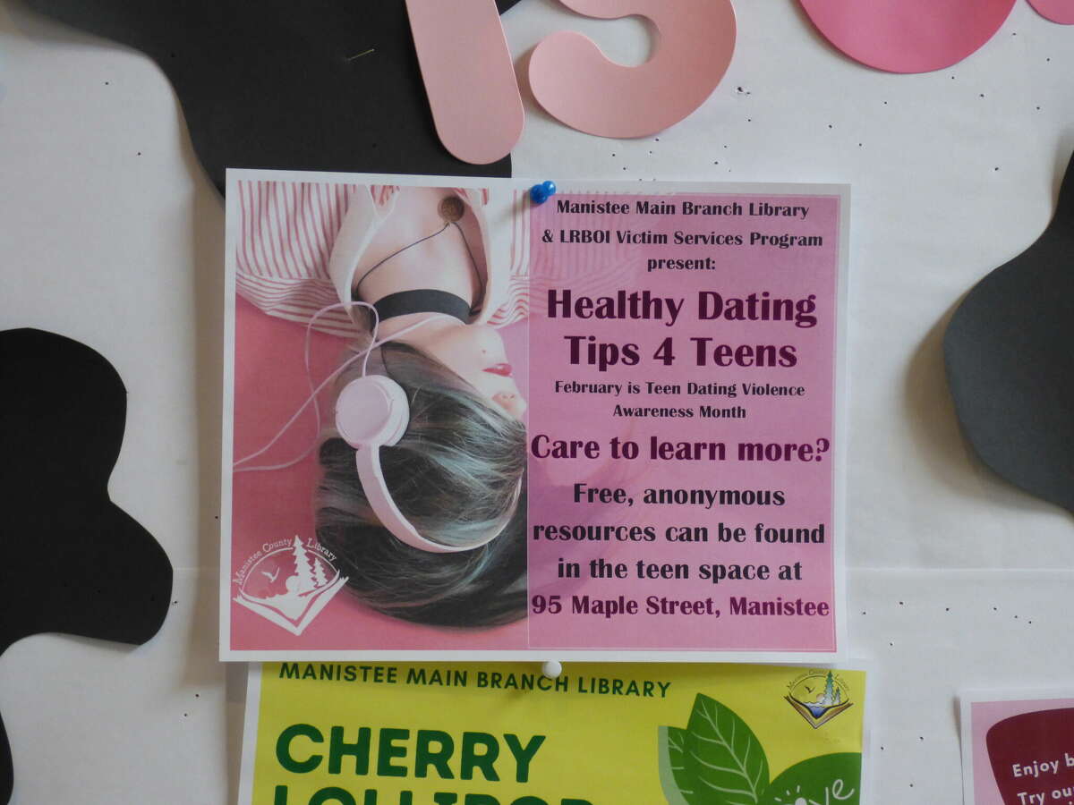 A flier posted at the Manistee County Library is one of many around the community that is being aimed at local teens for Teen Dating Violence Awareness Month. 