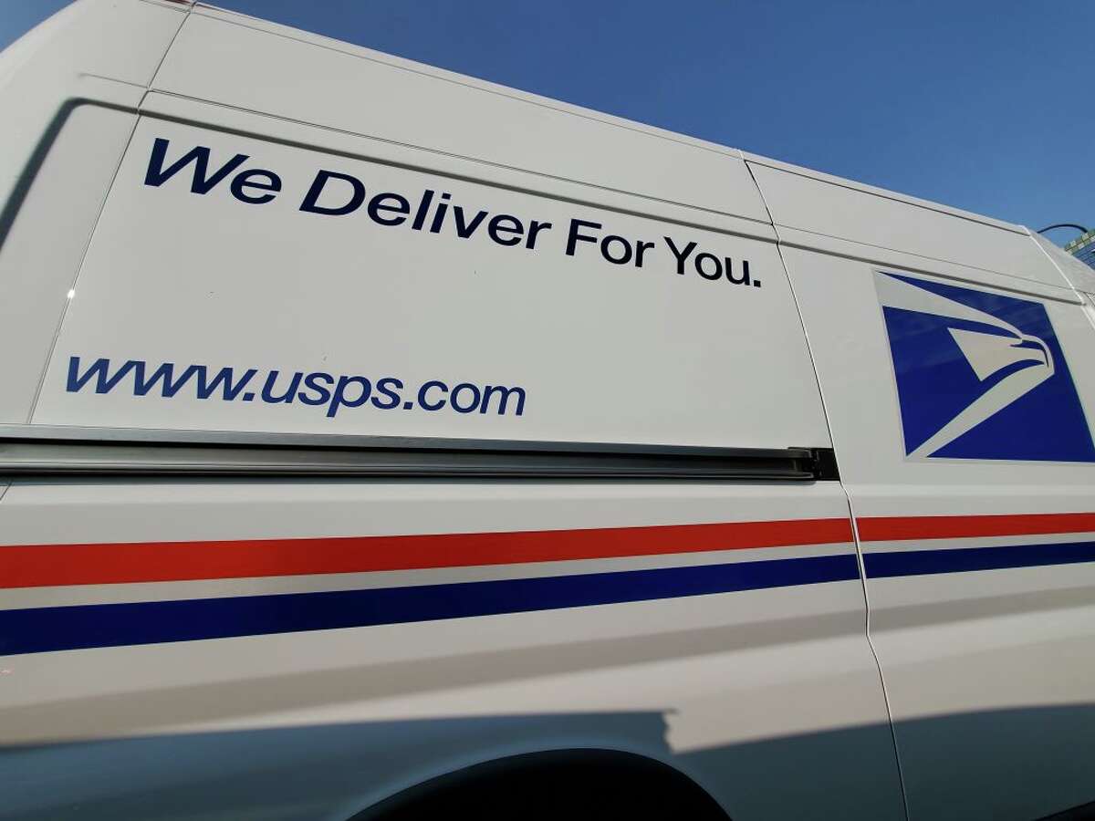 FILE: Wide angle view of United States Postal Service (USPS) truck