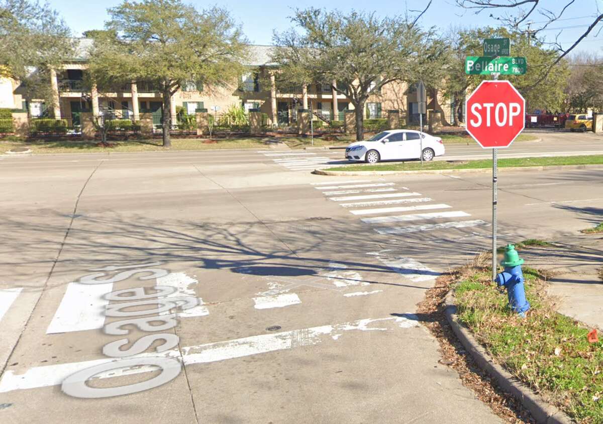 The 7800 block of Bellaire Boulevard at Osage Street, seen here via Google Maps Street View in February 2021. This stretch of Bellaire Boulevard is included in Houston's High Injury Network of roads, which represents six percent of roadways in Houston that account for 60 percent of deadly and injurious crashes. 