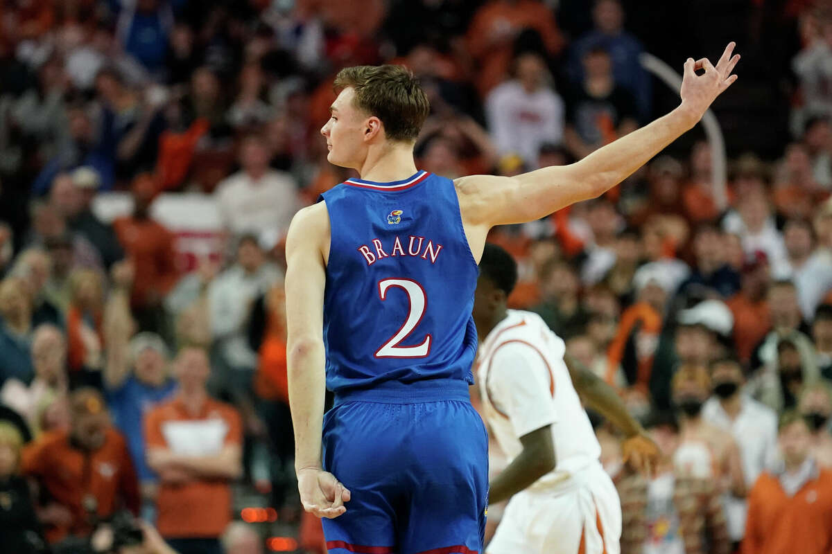 Kansas guard Christian Braun (2) reacts after scoring against Texas during the second half of an NCAA college basketball game, Monday, Feb. 7, 2022, in Austin, Texas. (AP Photo/Eric Gay)