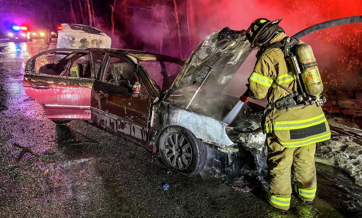 Firefighters in Bethel, Conn. put out a car fire on Katrina Circle Tuesday, Feb. 8, 2022. Officials said no one was injured during the incident.
