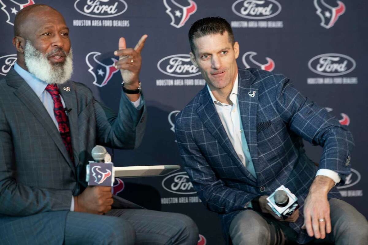 Lovie Smith, left, answers questions with general manager Nick Caserio as he is introduced as the Houston Texans new head coach during a news conference Tuesday, Feb. 8, 2022, in Houston. Smith is the fifth head coach in franchise history.