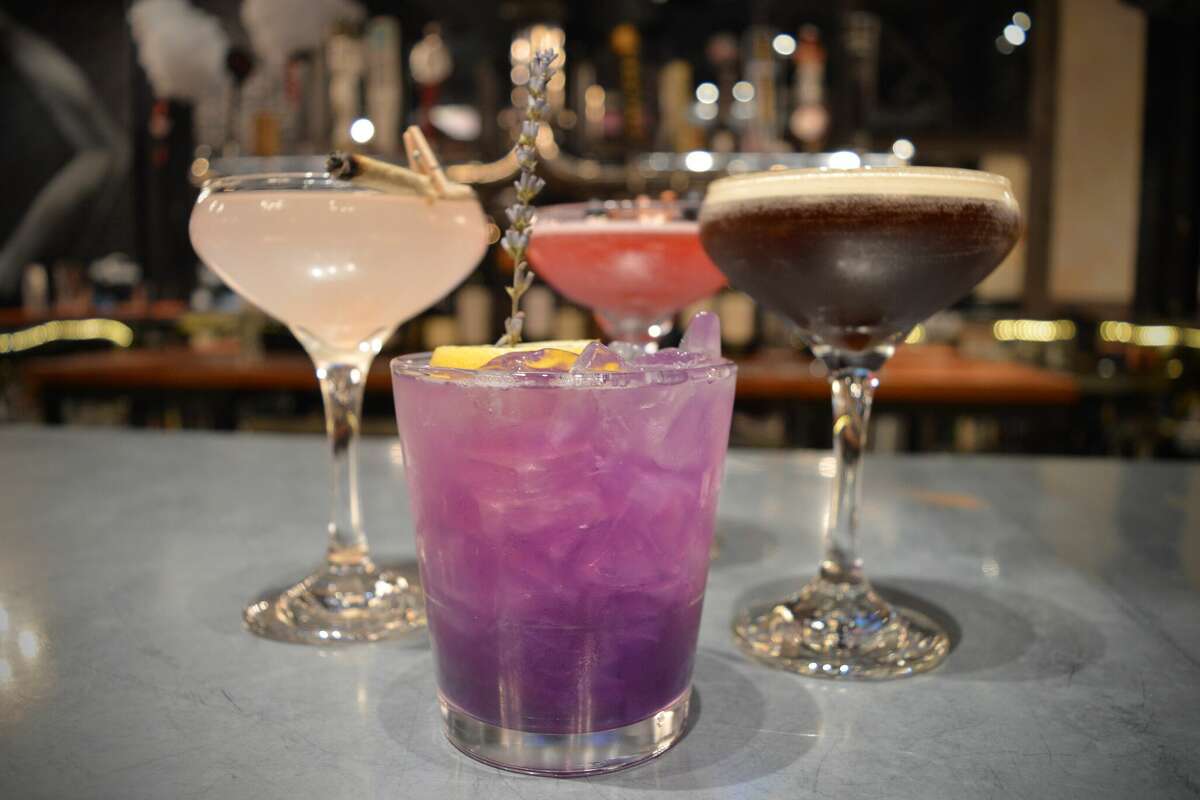 The Unicorns are Real (center), Smokeshow (left), Tinder Date (back center) and Espresso Martini (right) cocktails at Via Gastrobar in New Haven, Conn.