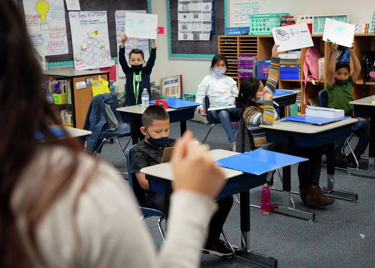 Third-graders at Dickinson ISD's Calder Road Elementary participate in a classroom activity.