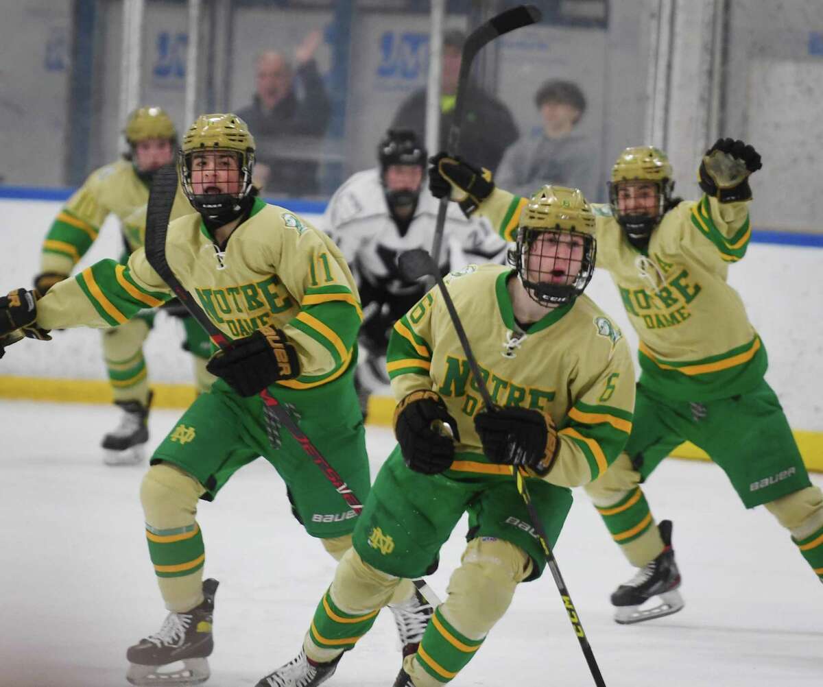 No. 1 Notre Dame-West Haven celebrates their third goal against No. 2 Xavier at the Champions Skating Center in Cromwell on Tuesday.
