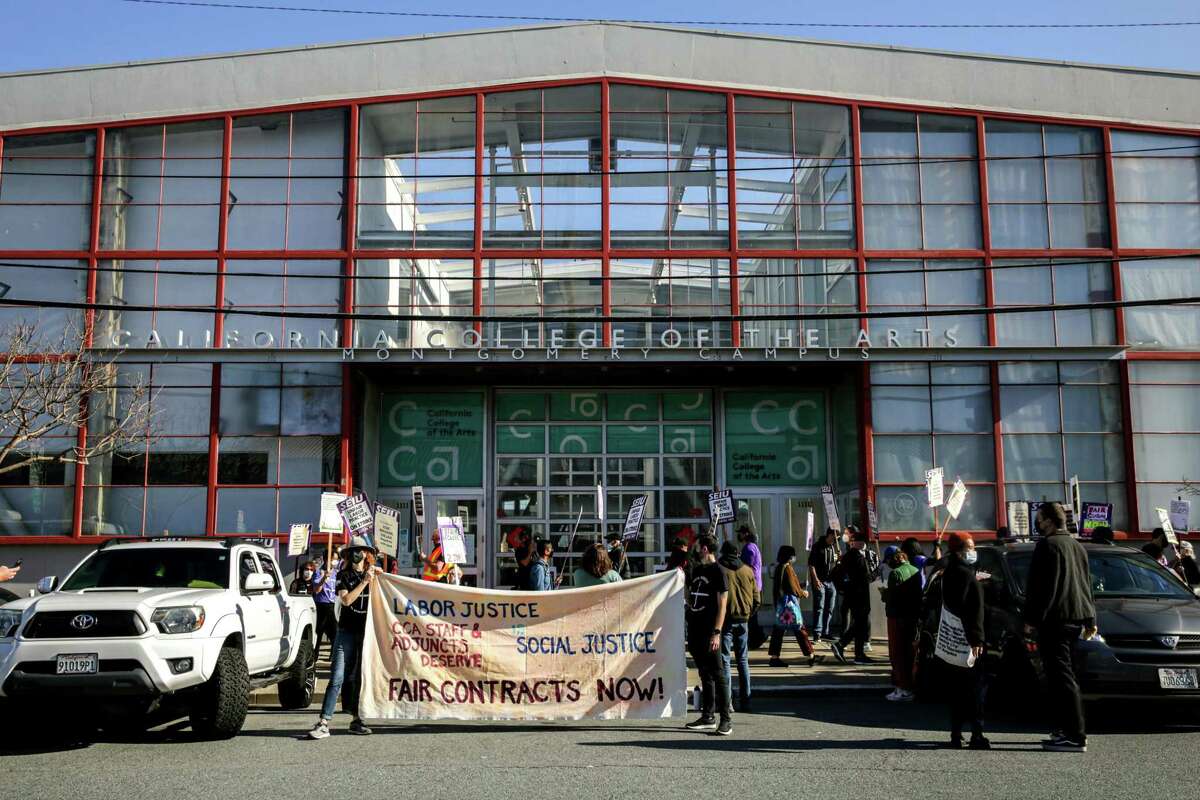 California College of the Arts’ staff and students strike in protest of the school’s unfair labor practices outside of its building in San Francisco, Calif. on Tuesday, Feb. 8, 2022. Union leaders said they have been negotiating a contract with CCA for over two years meanwhile classes have been cancelled, facilities shuttered and other services interrupted.