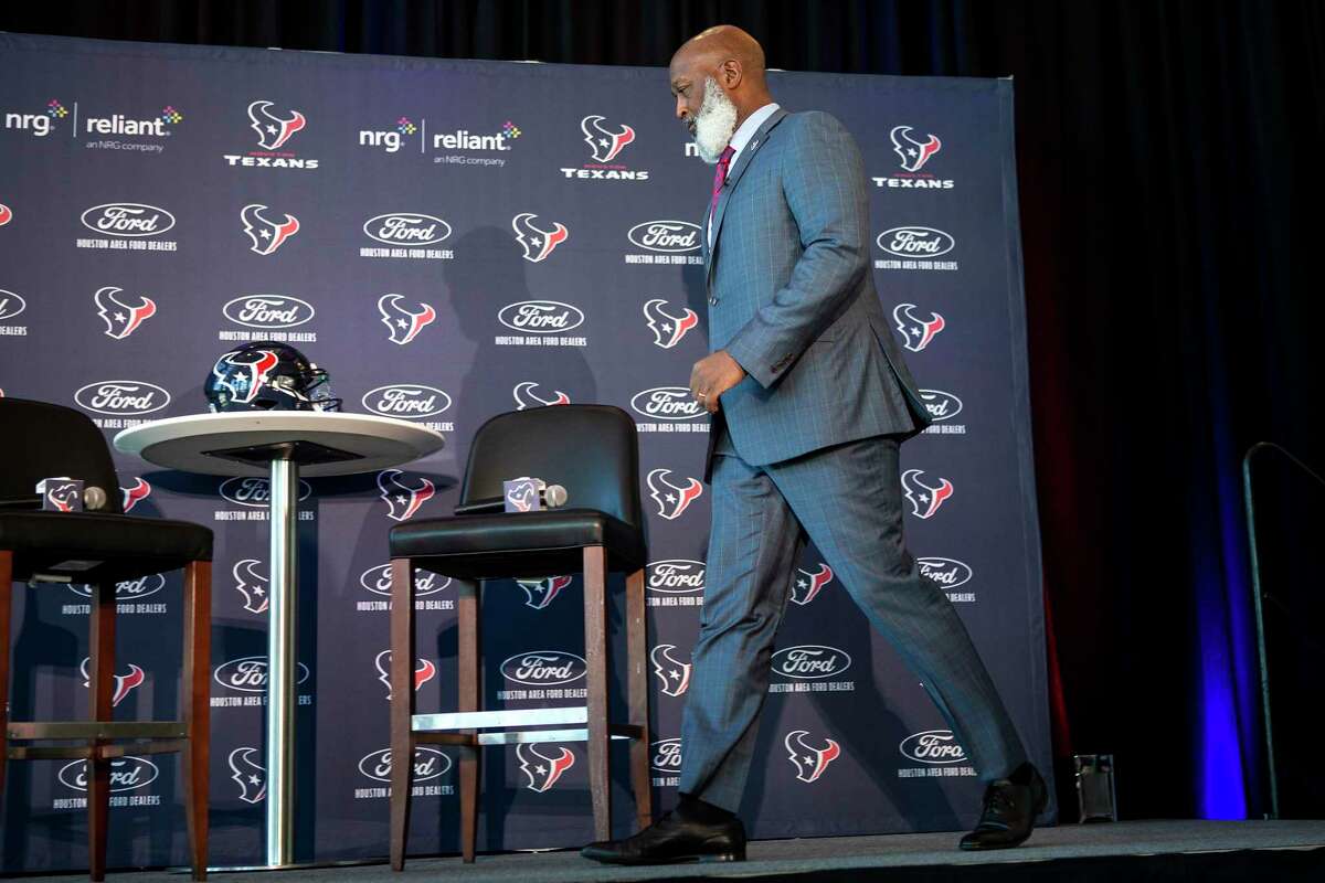 Lovie Smith walks to his seat as he is introduced as the Houston Texans new head coach during a news conference Tuesday, Feb. 8, 2022, in Houston. Smith is the fifth head coach in franchise history.