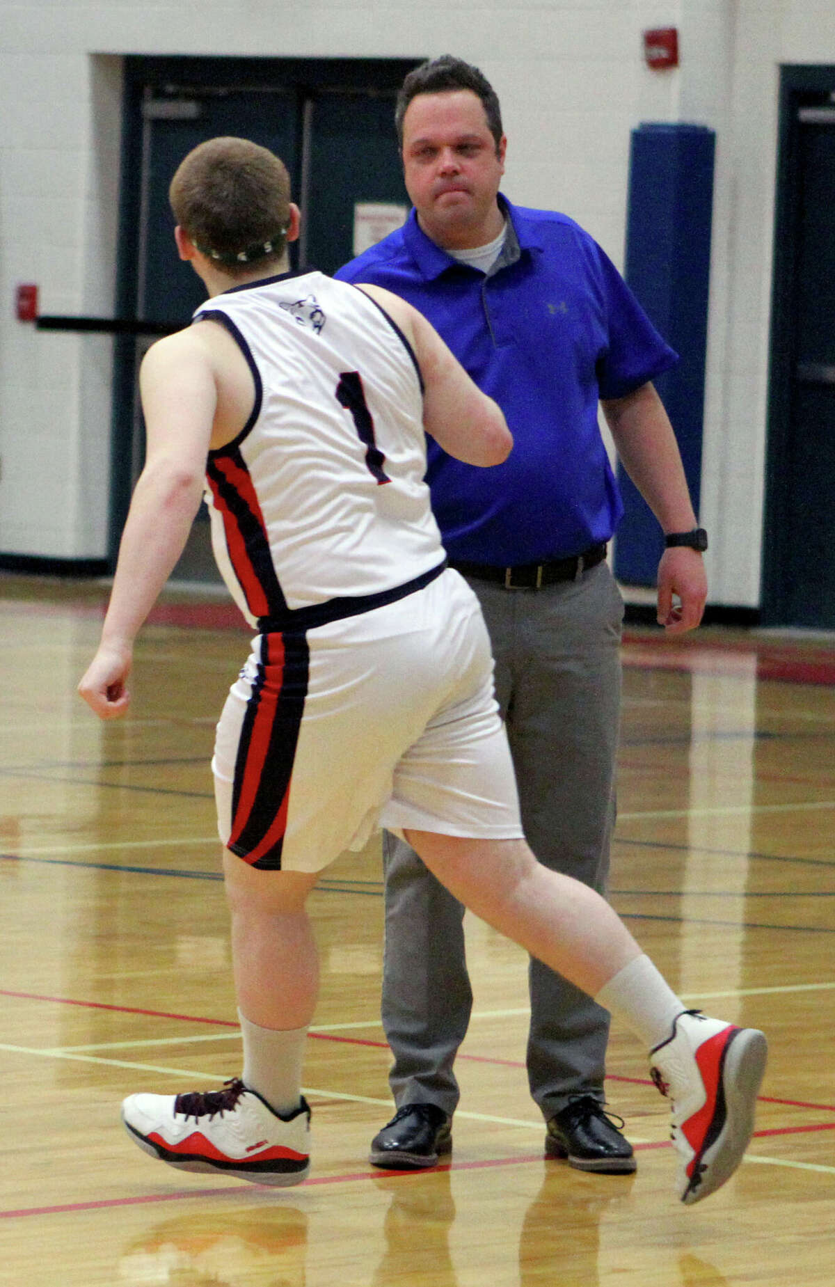 Morley Stanwood boys basketball coach Jason Kostecki spent 14 years as CCA's boys coach, and another three as the coach of the Cougar girls.