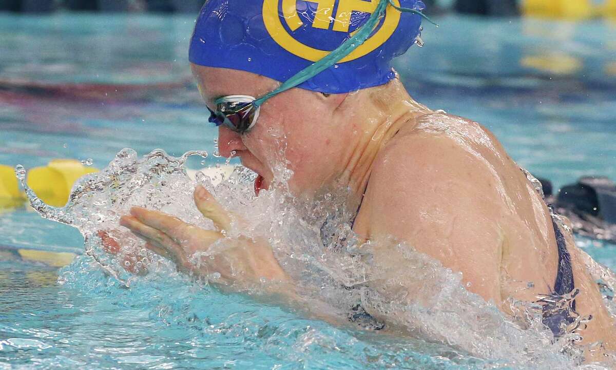 Alamo Heights’ Elizabeth Walsh swims to first place in girls 100 yard breaststroke during the 2022 UIL Region 7-5A Swimming and Diving Championships at Bill Walker Pool on Tuesday, Feb. 8, 2022.