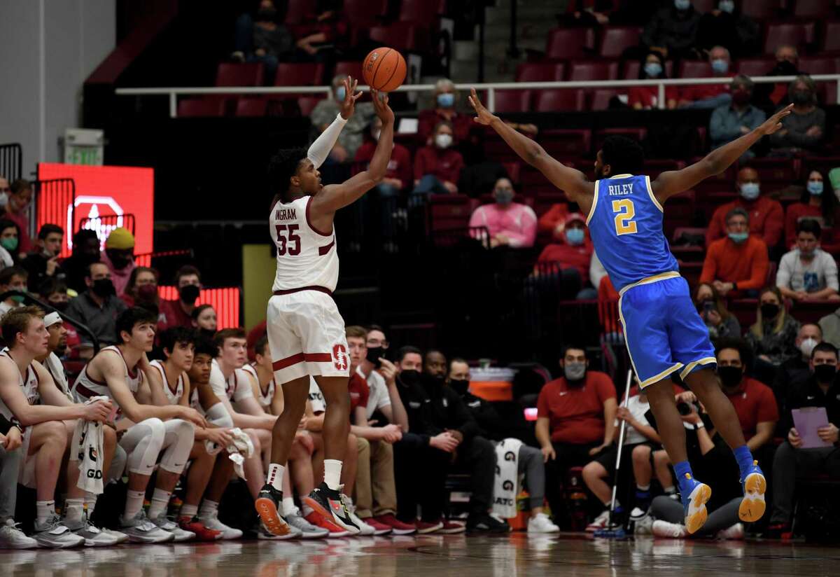 PALO ALTO, CALIFORNIA - FEBRUARY 08: Harrison Ingram #55 of the Stanford Cardinal shoots over Cody Riley #2 of the UCLA Bruins at Stanford Maples Pavilion on February 08, 2022 in Palo Alto, California. (Photo by Michael Urakami/Getty Images)