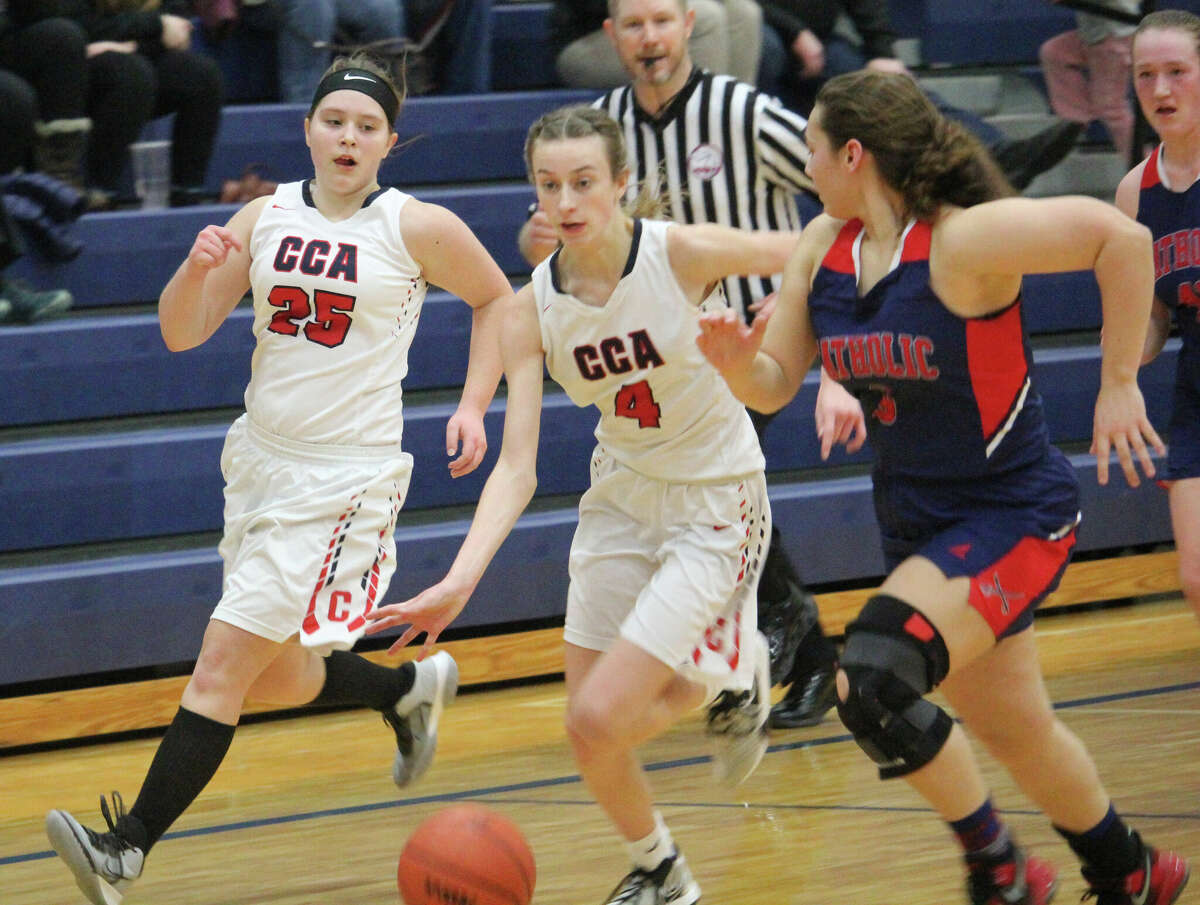 Amelia Thompson (4) dribbles down the court for Crossroads in recent action.