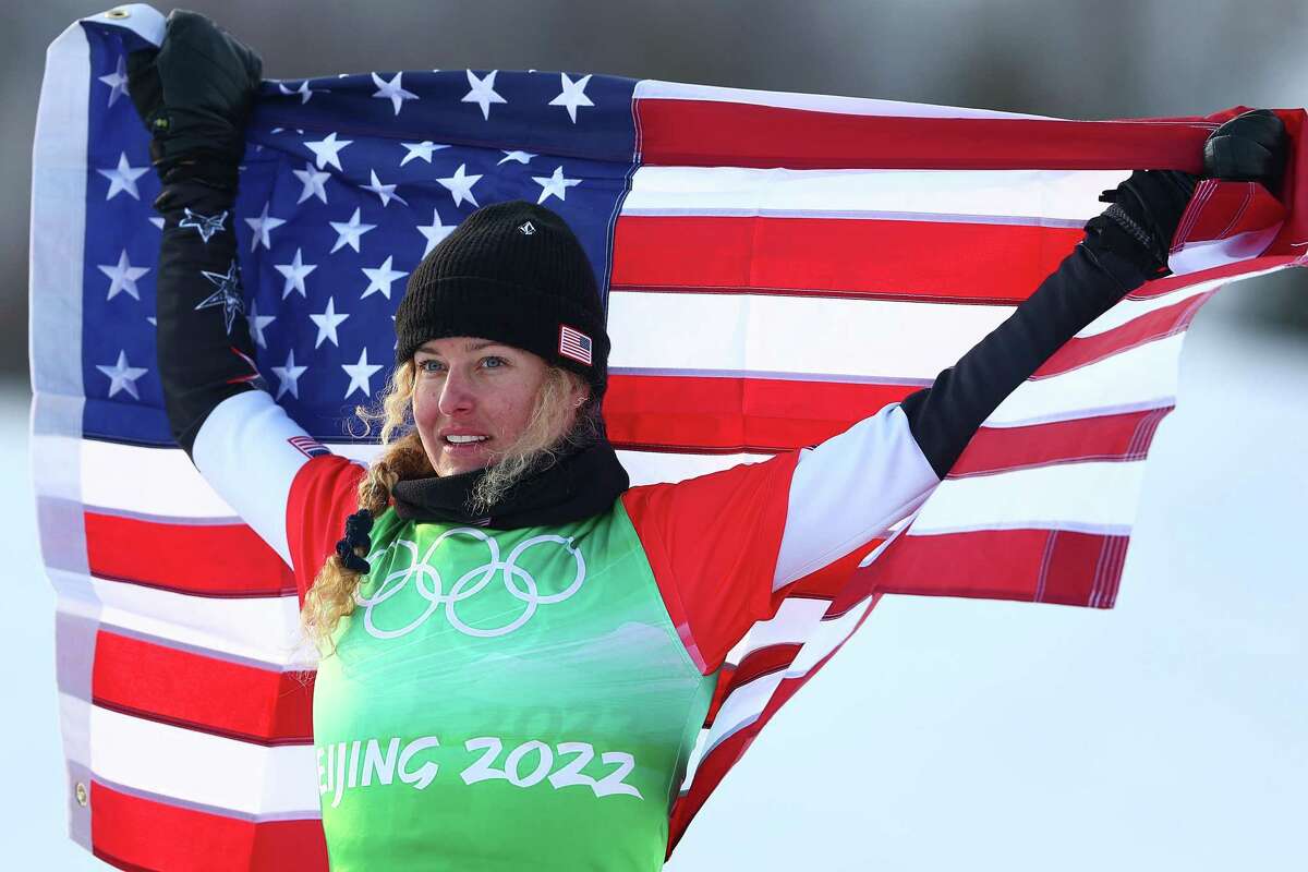 ZHANGJIAKOU, CHINA - FEBRUARY 09: Gold medallist Lindsey Jacobellis of Team United States poses during the Women's Snowboard Cross flower ceremony on Day 5 of the Beijing 2022 Winter Olympic Games at Genting Snow Park on February 09, 2022 in Zhangjiakou, China. (Photo by Clive Rose/Getty Images)