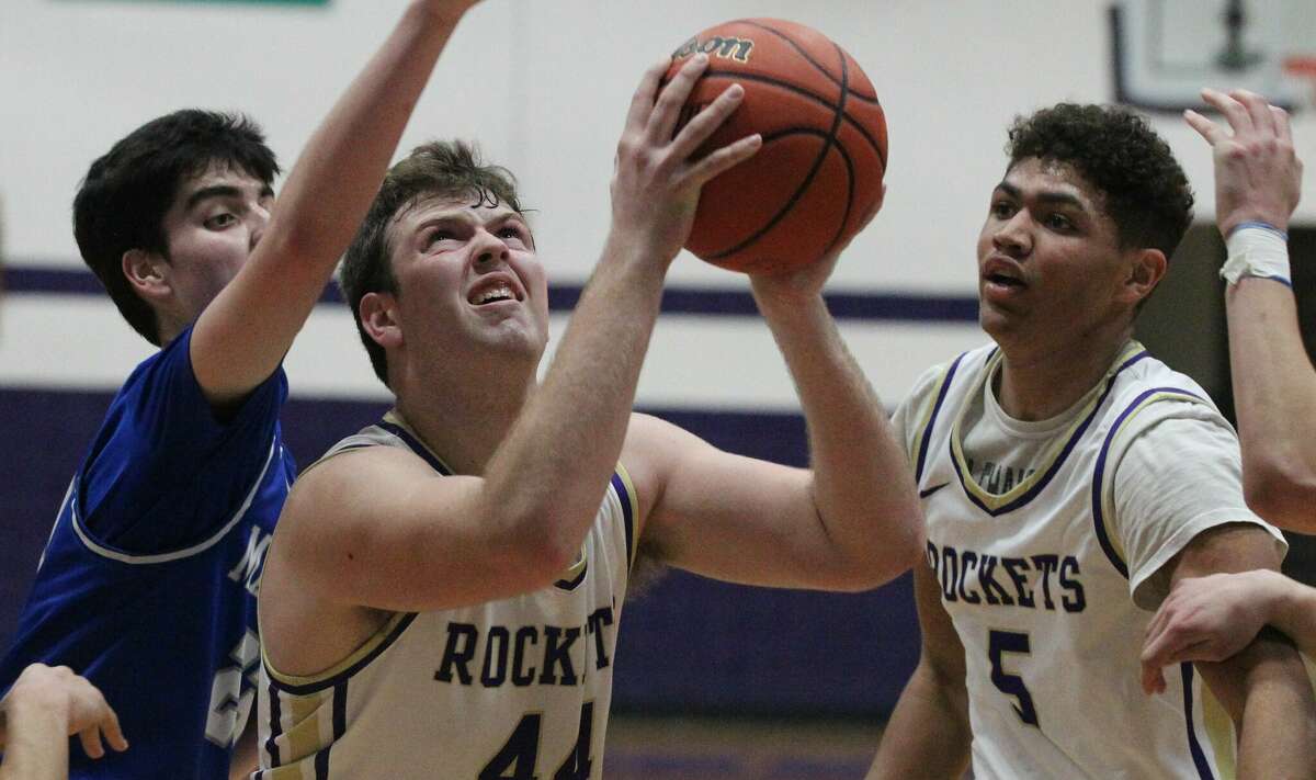 Action from the Routt boys'  basketball team's win over Alton Marquette Tuesday night at the Routt Dome in Jacksonville