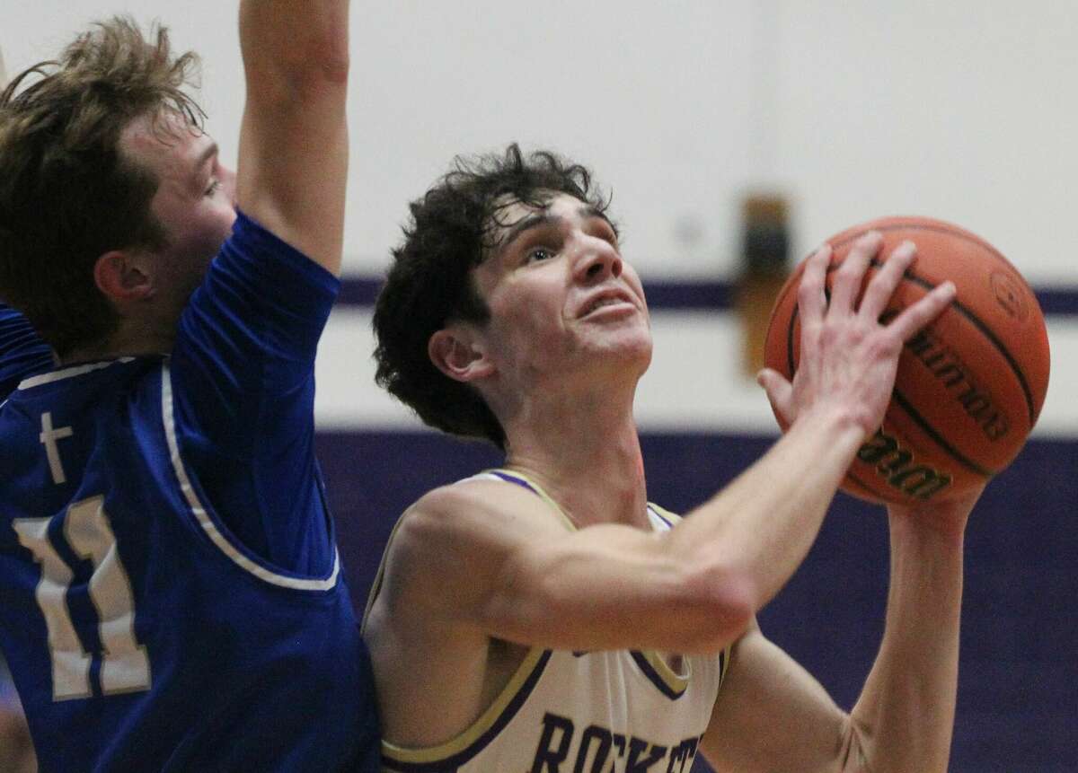 Action from the Routt boys'  basketball team's win over Alton Marquette Tuesday night at the Routt Dome in Jacksonville