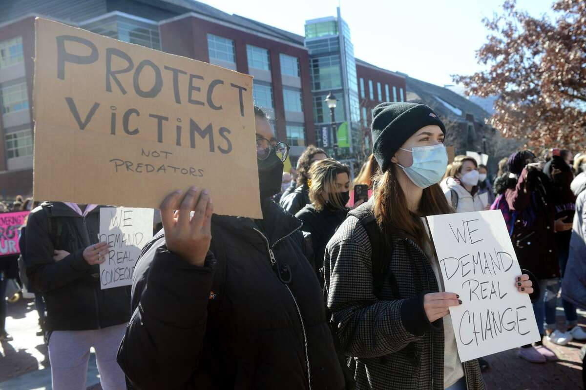 Hundreds of students turned out for a rally on the University of Connecticut campus, in Storrs, Conn. Feb. 9, 2022. The students gathered to express their frustrations with the university’s handling of sexual assault cases.