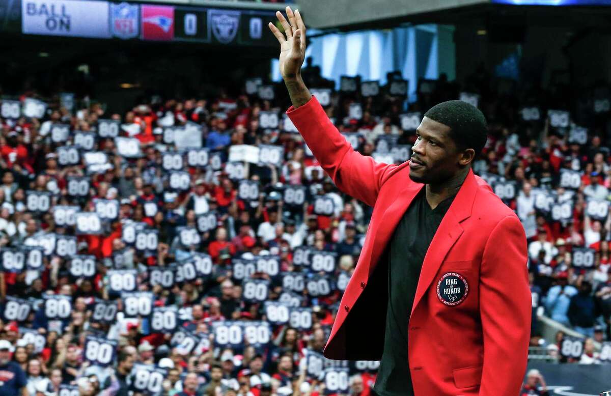 Andre Johnson, waving to crowd when inducted into the Texans ring of honor in 2017, is awaiting a call from the Pro Football Hall of Fame and a different color jacket.
