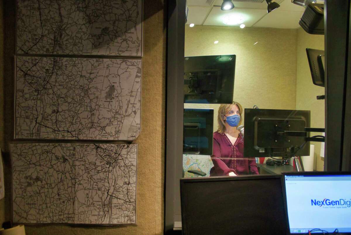 Diane Donato, a news anchor at WGY station, works inside one of the booths on Tuesday, Feb. 8, 2022, in Latham, N.Y.