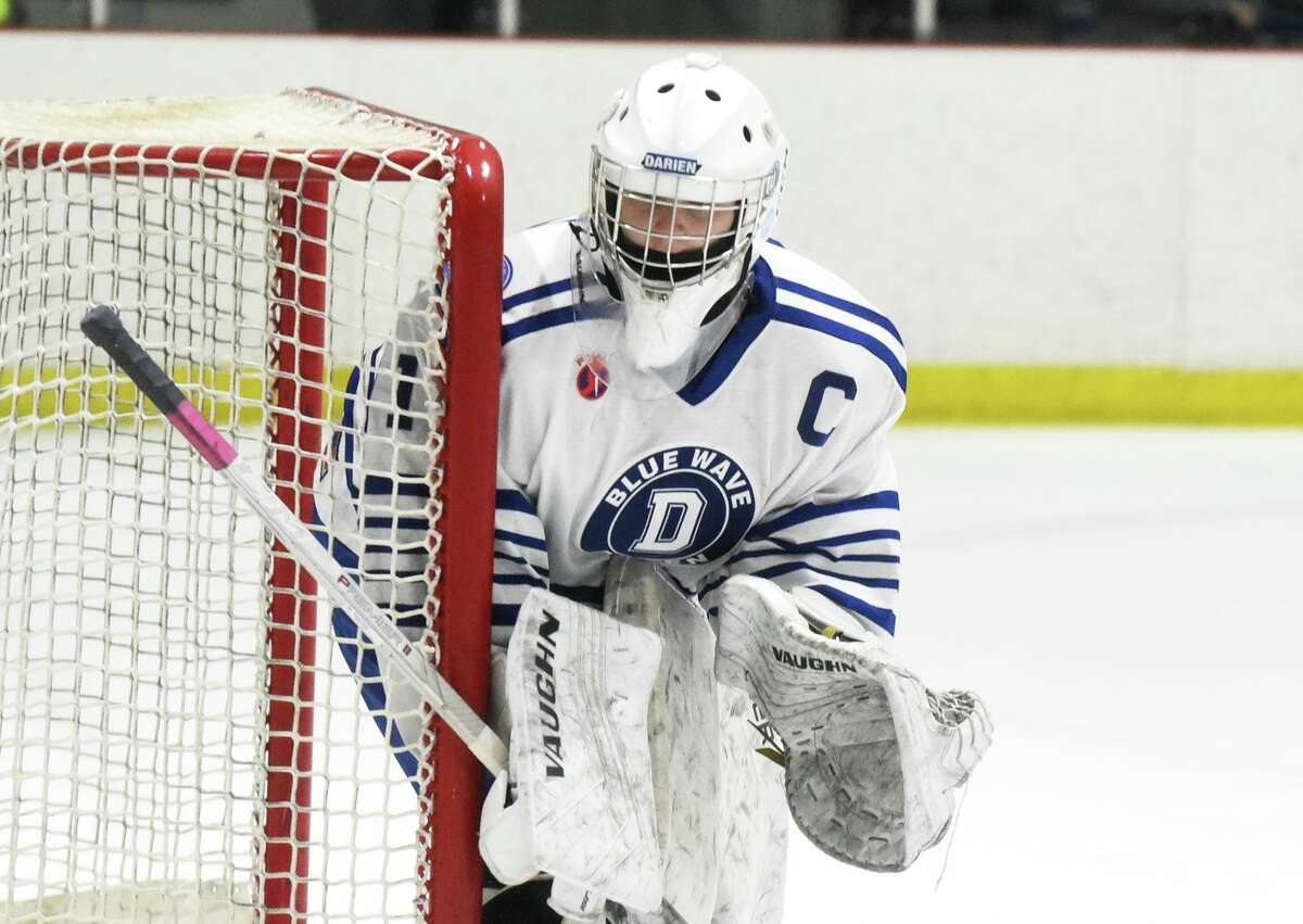 Darien goalie Claire Haupt guards the net against Simsbury at the Darien Ice House on Jan. 26.