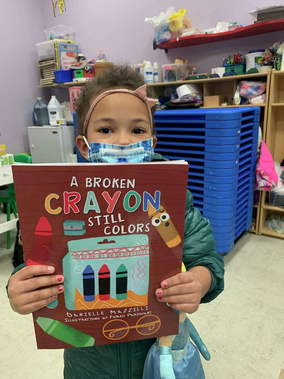 Ridgefield High alumna publishes book to help children of divorce cope