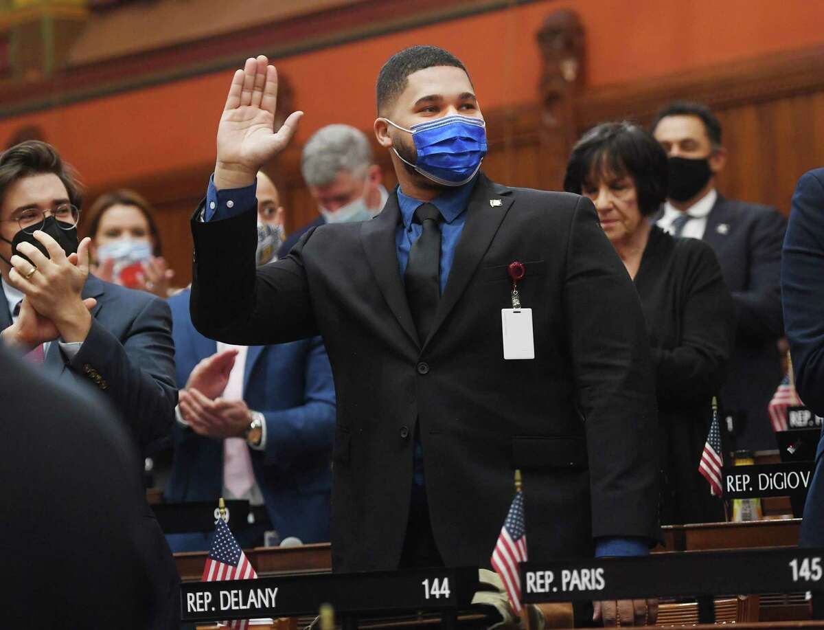 Newly elected State Rep. Hubert Delany, D-Stamford, waves as he is introduced to colleagues during the opening day of the 2022 legislative session Wednesday.