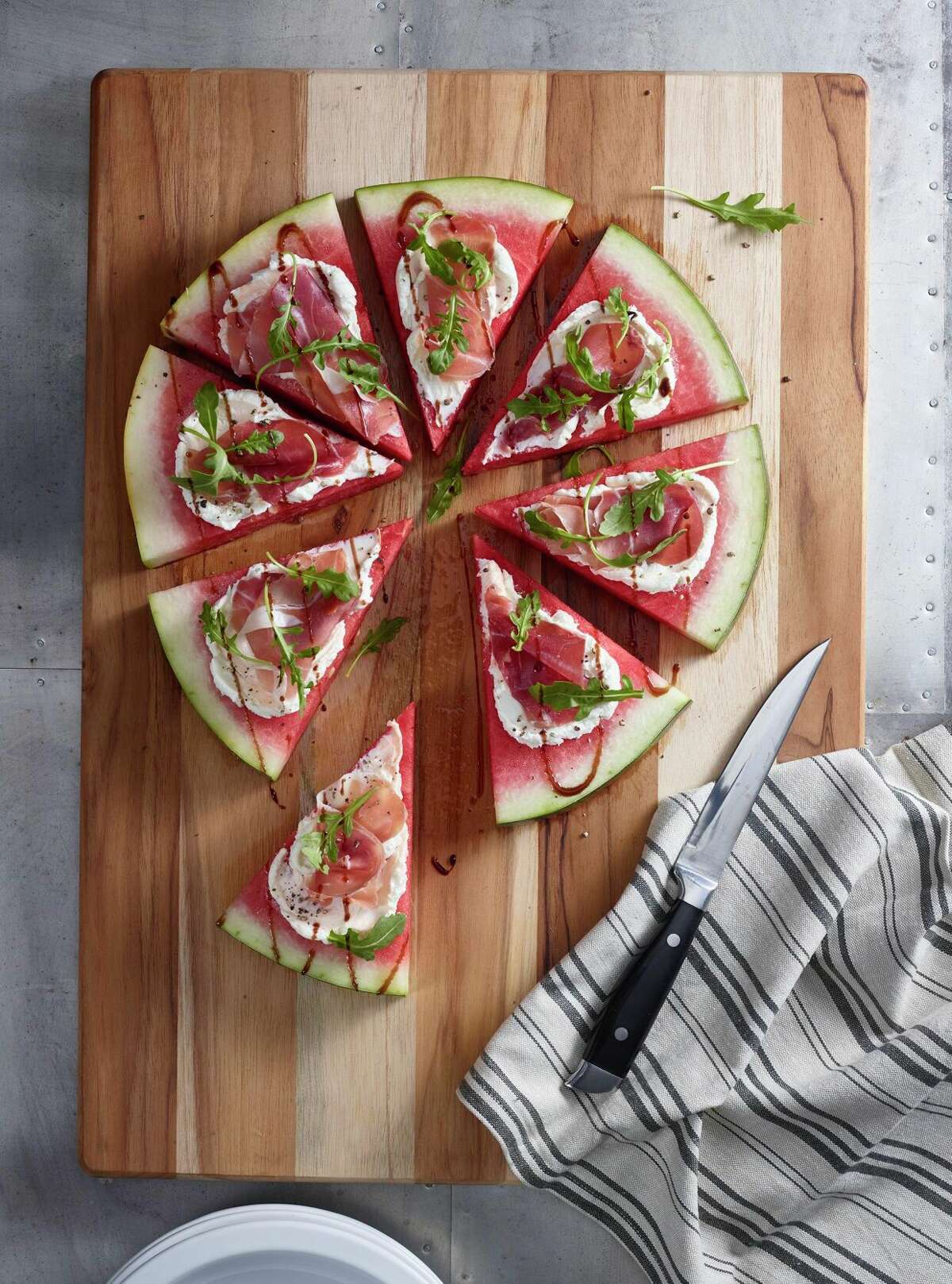 Savory Watermelon Pizza: Paired with savory ingredients like prosciutto and goat cheese, this savory “pizza” skips the bread to make watermelon the new star.