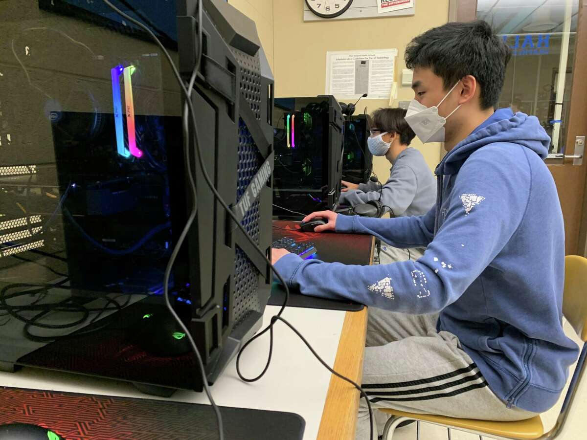 David Do and Ryan Jiang, members of the Hall High School esports team, play League of Legends.