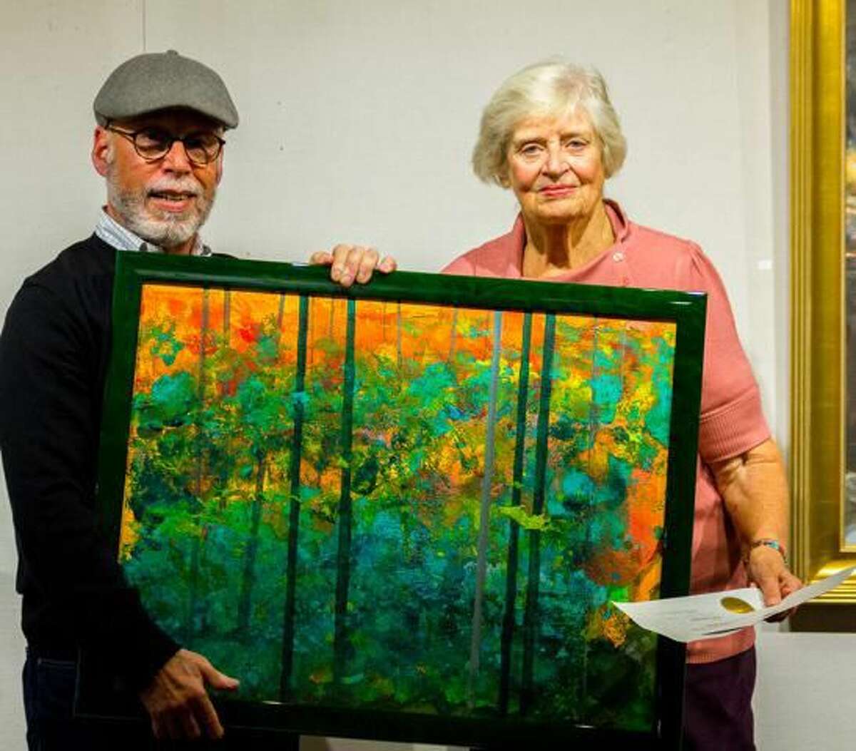 Steve Tanenbaum, of New Milford ,receives the Ridgewood Art Institute Award of Excellence from KAA President Connie Horton for his acrylic titled, ?“Indian Summer.?”