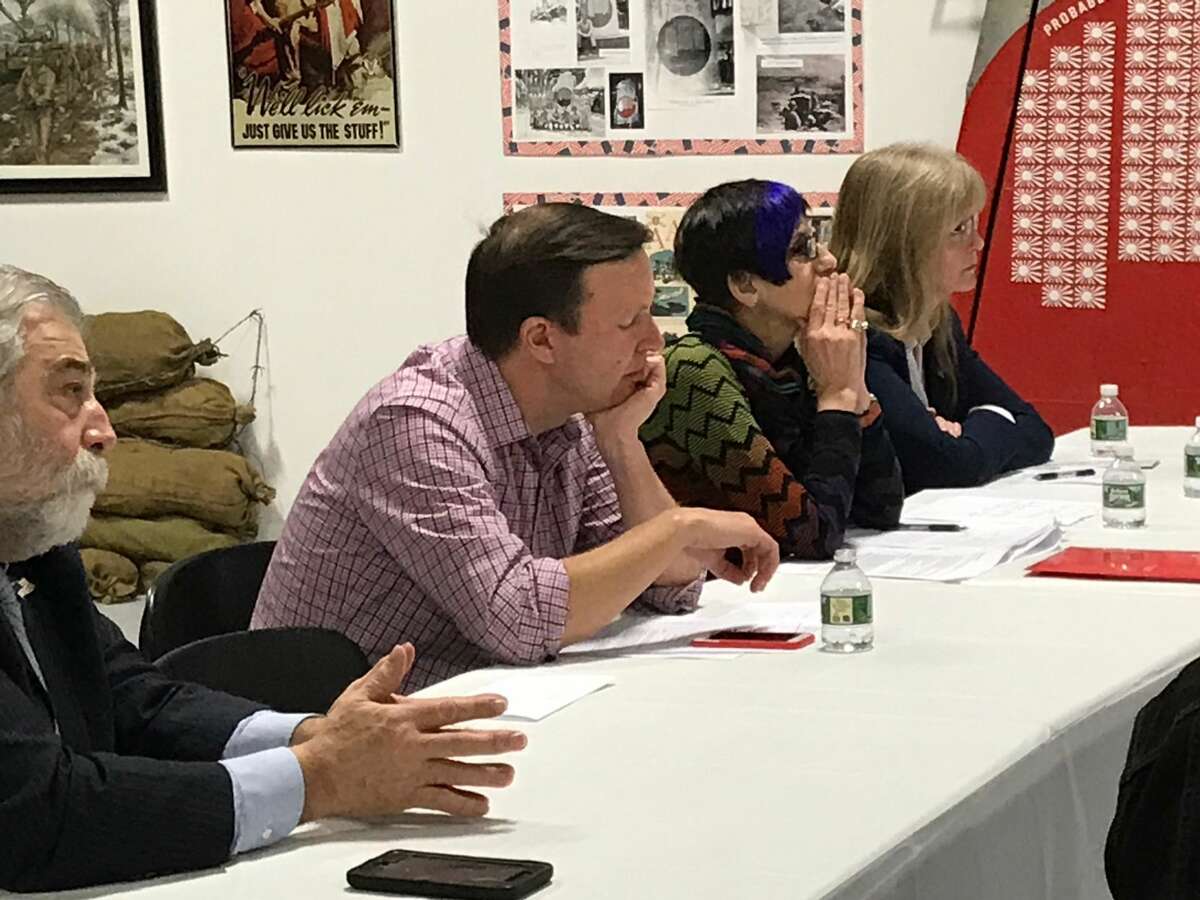 U.S. Sen. Chris Murphy, D-Conn., (shown at center), U.S. Rep. Rose DeLauro, D-3, and West Haven Mayor Nancy Rossi listen to veterans’ health care concerns Saturday during a forum at the West Haven Veterans Museum.