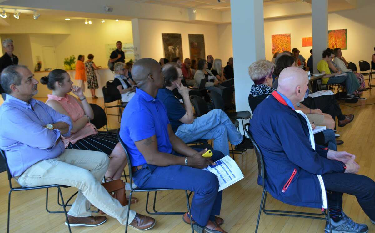 Audience members at a recent presentation on a comprehensive economic development strategy held at Five Points Gallery in Torrington on July 27.