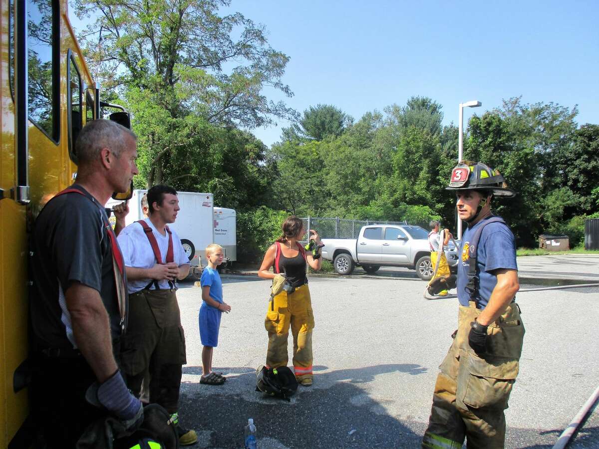 Torrington Fire Department firefighter Mike Farrel, far right, served as the instructor for training on the tower.