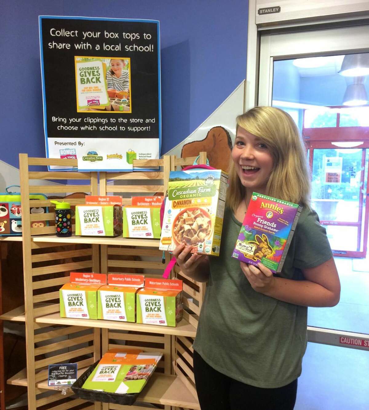 New Morning Market is supporting local schools by collecting Box Tops for Education at the store. Employee Kat Lynch holds Annie's and Cascadian Farm products that now have Box Tops for Education. Residents can support local schools by dropping off Box Tops logos at the market at 129 Main St. North in Woodbury.