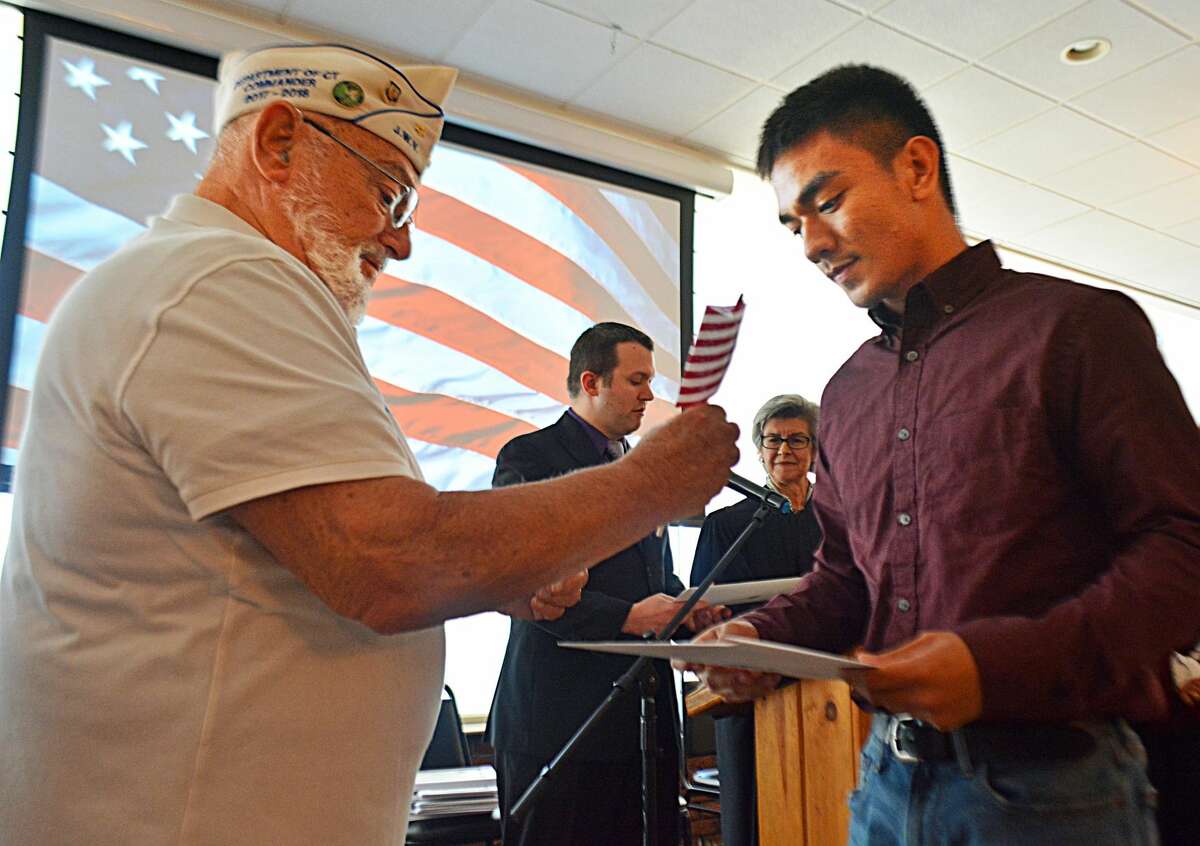 U.S. Citizenship and Immigration Services presented 52 citizenship candidates to U.S. Court of Appeals for the Second Circuit Judge Susan L. Carney during a military appreciation naturalization ceremony Friday at the Middletown Elks Crystal Ballroom.